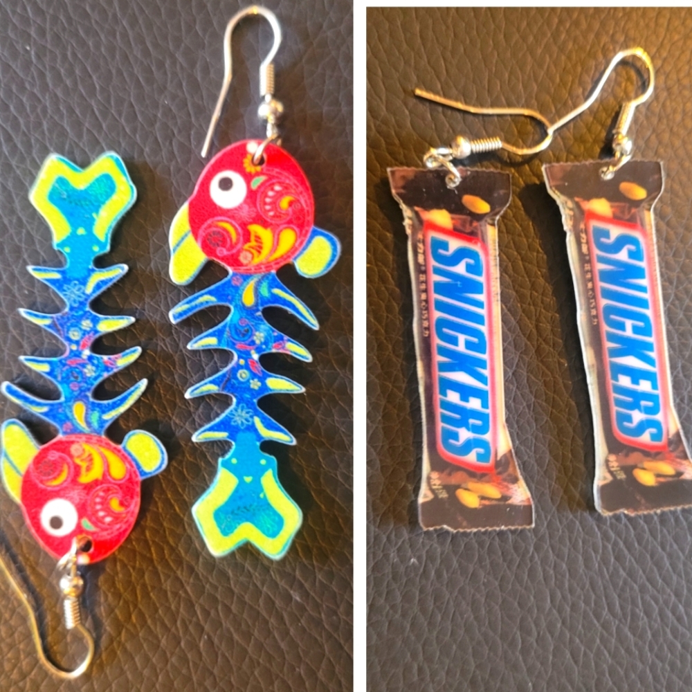 (2)pairs of whimsical earrings.